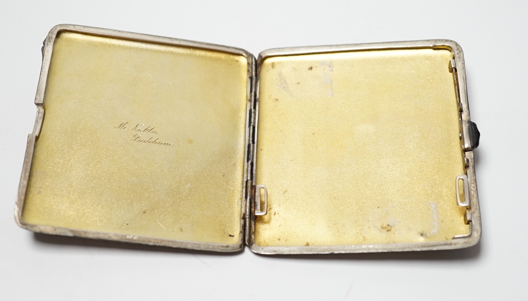 A 1920's silver cigarette case, with unusual engine turned finish, import marks for the London Chain Bag Company, London, 1927, 83mm.